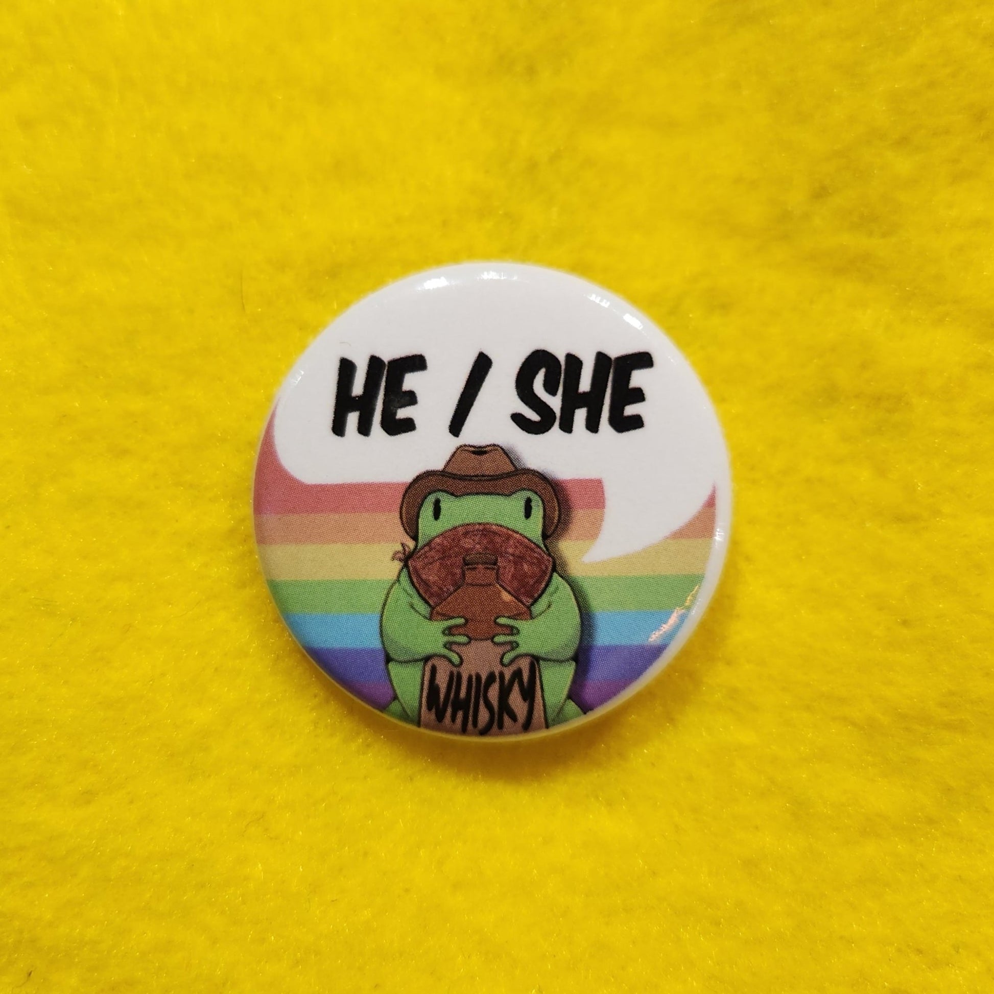 Whisky Frog Pronoun Button | HE/SHE | 1.25" - Deviantkreations